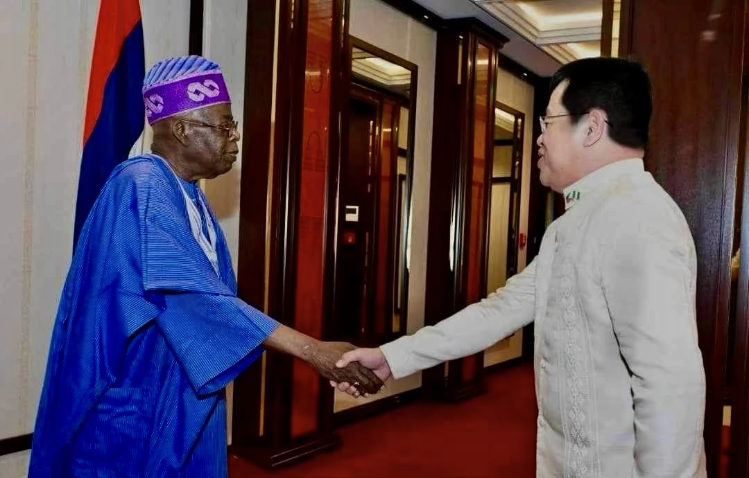 POC Handshake with Pres Bola Tinubu GCFR